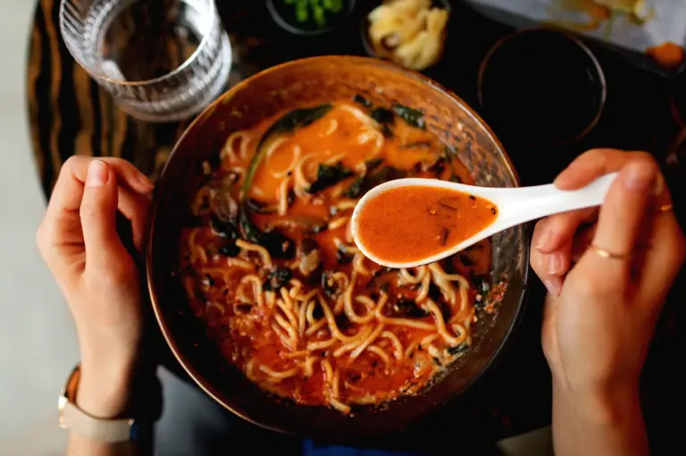 Spicy tonkotsu ramen with rich broth and noodles close-up in Singapore ramen restaurant