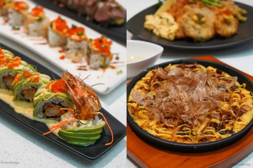 A variety of Japanese dishes including sushi rolls topped with avocado and shrimp, and a savory pancake topped with bonito flakes.