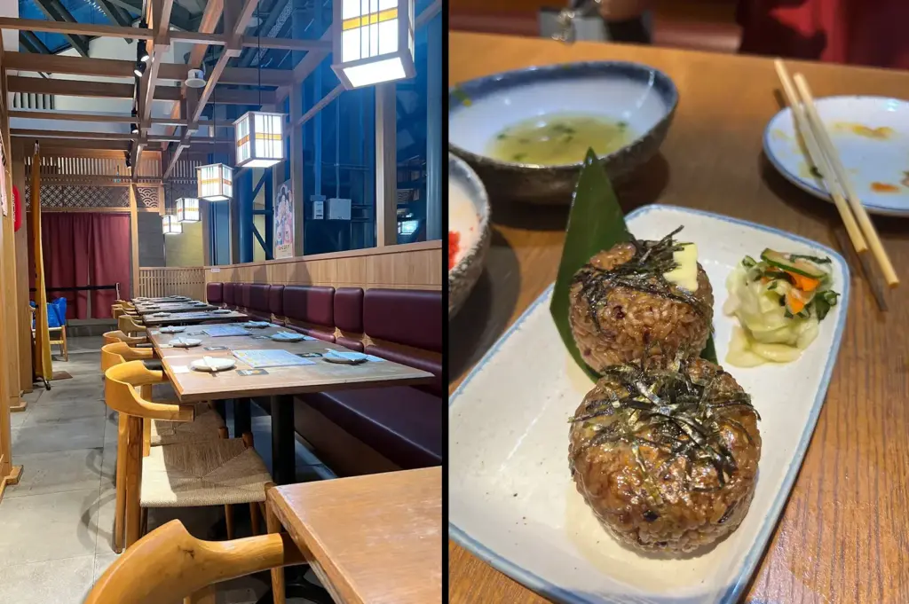 Japanese restaurant interior with wooden seating alongside grilled rice balls served with pickled vegetables on a ceramic plate