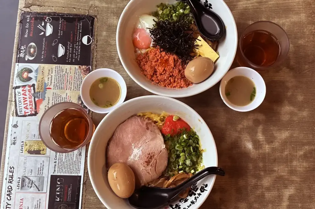Mazesoba bowl with poached egg, nori, and scallions